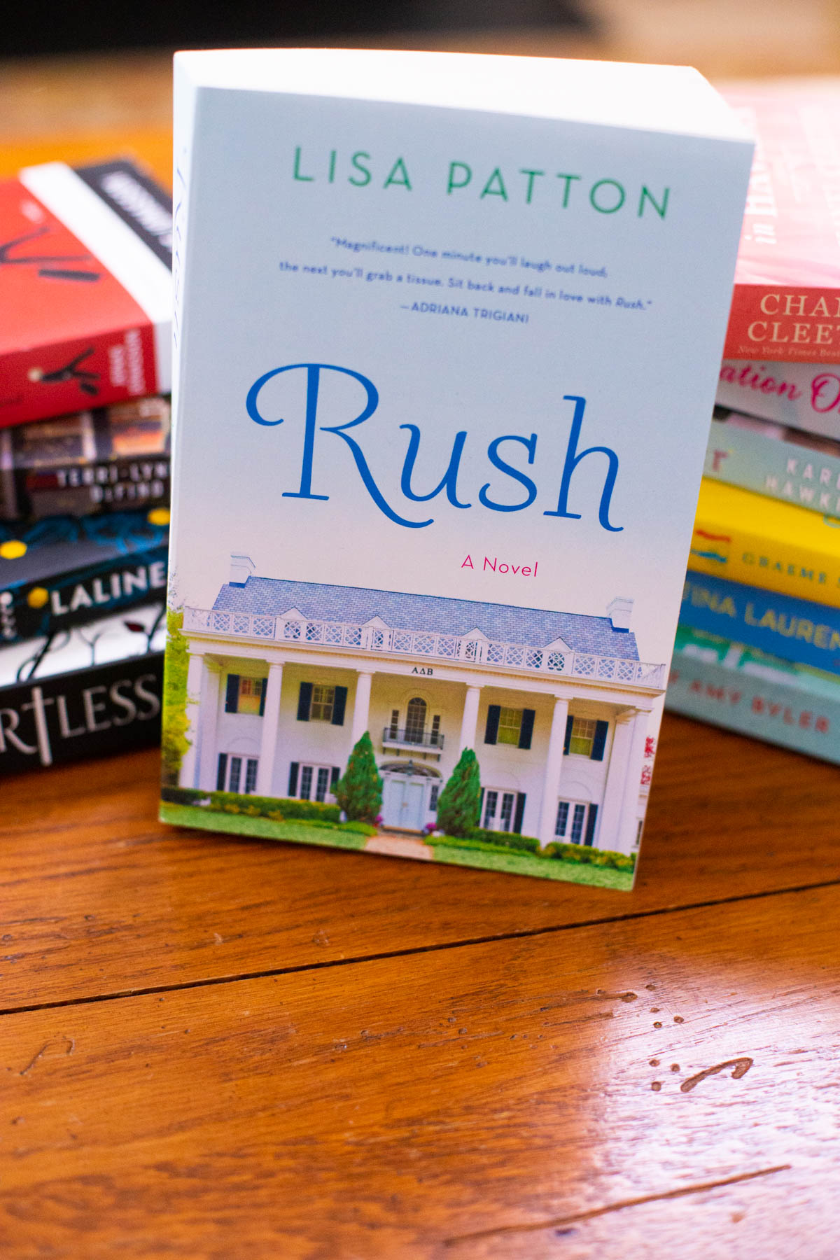 A copy of the book Rush is on the table.