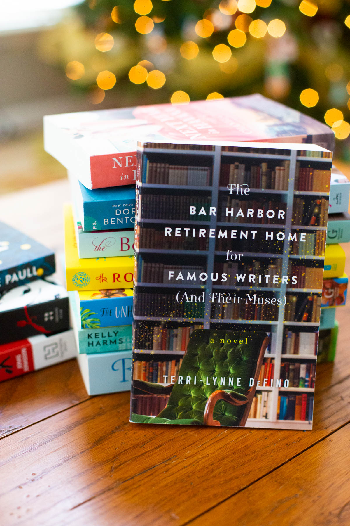 The Bar Harbor Retirement Home for Famous Writers sits on the table.