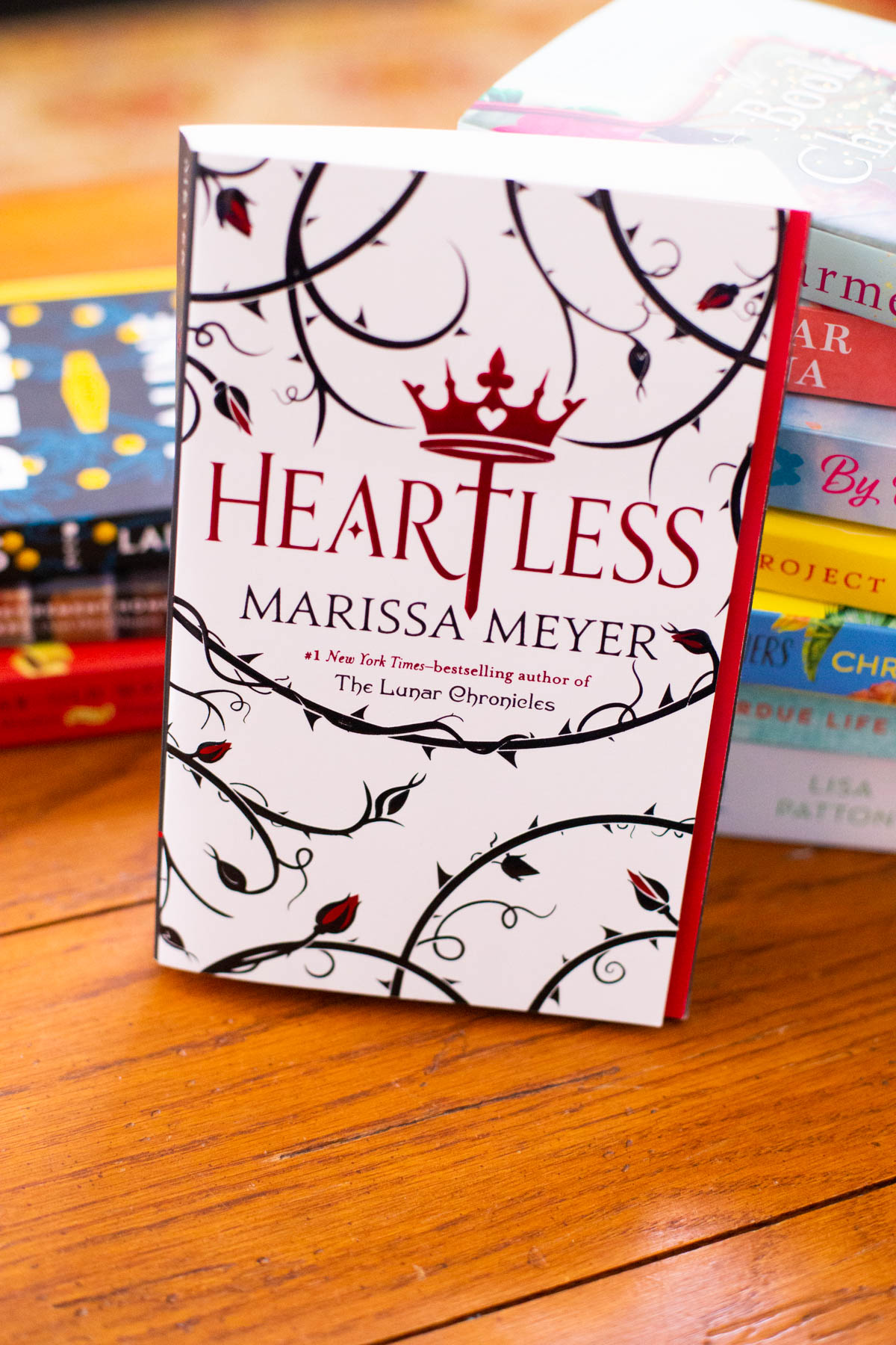 A copy of the book Heartless is on the table.