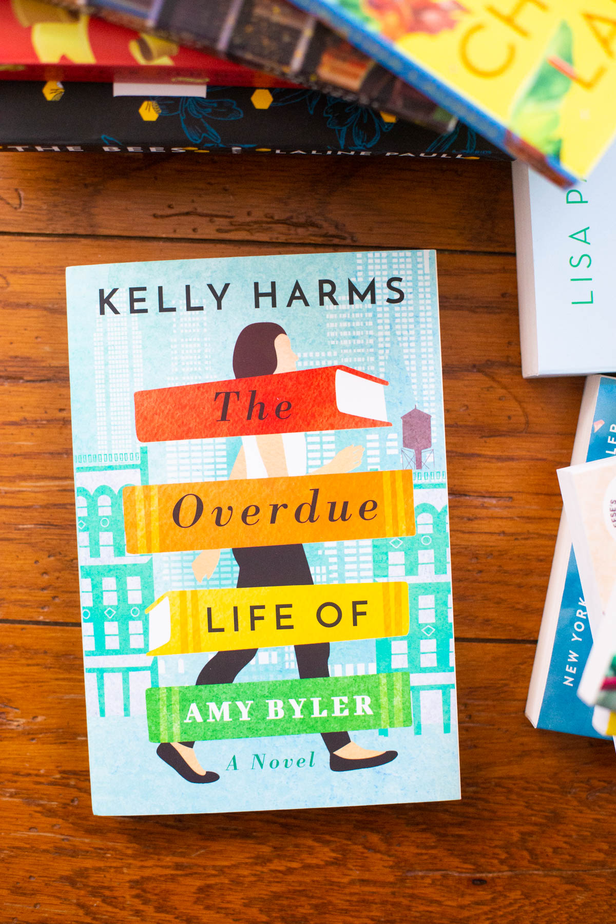 A copy of the book The Overdue Life of Amy Byler is on a table.