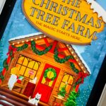 The cover of the book The Christmas Tree Farm is on the screen of an iPad.