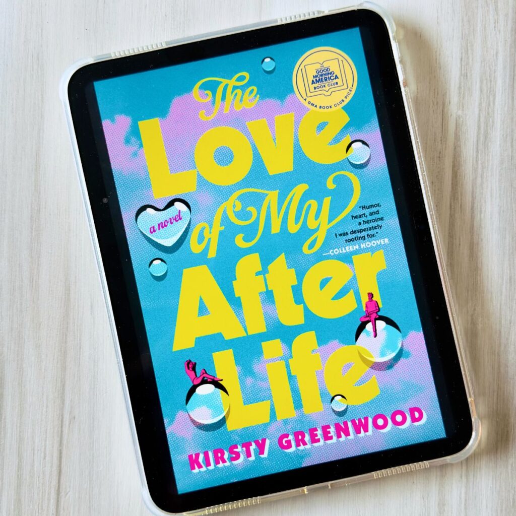 The book The Love of My After Life by Kirsty Greenwood is on the screen of an iPad.