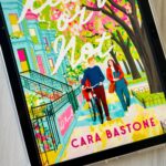 The cover of the book Ready or Not by Cara Bastone is on the screen of an ipad.