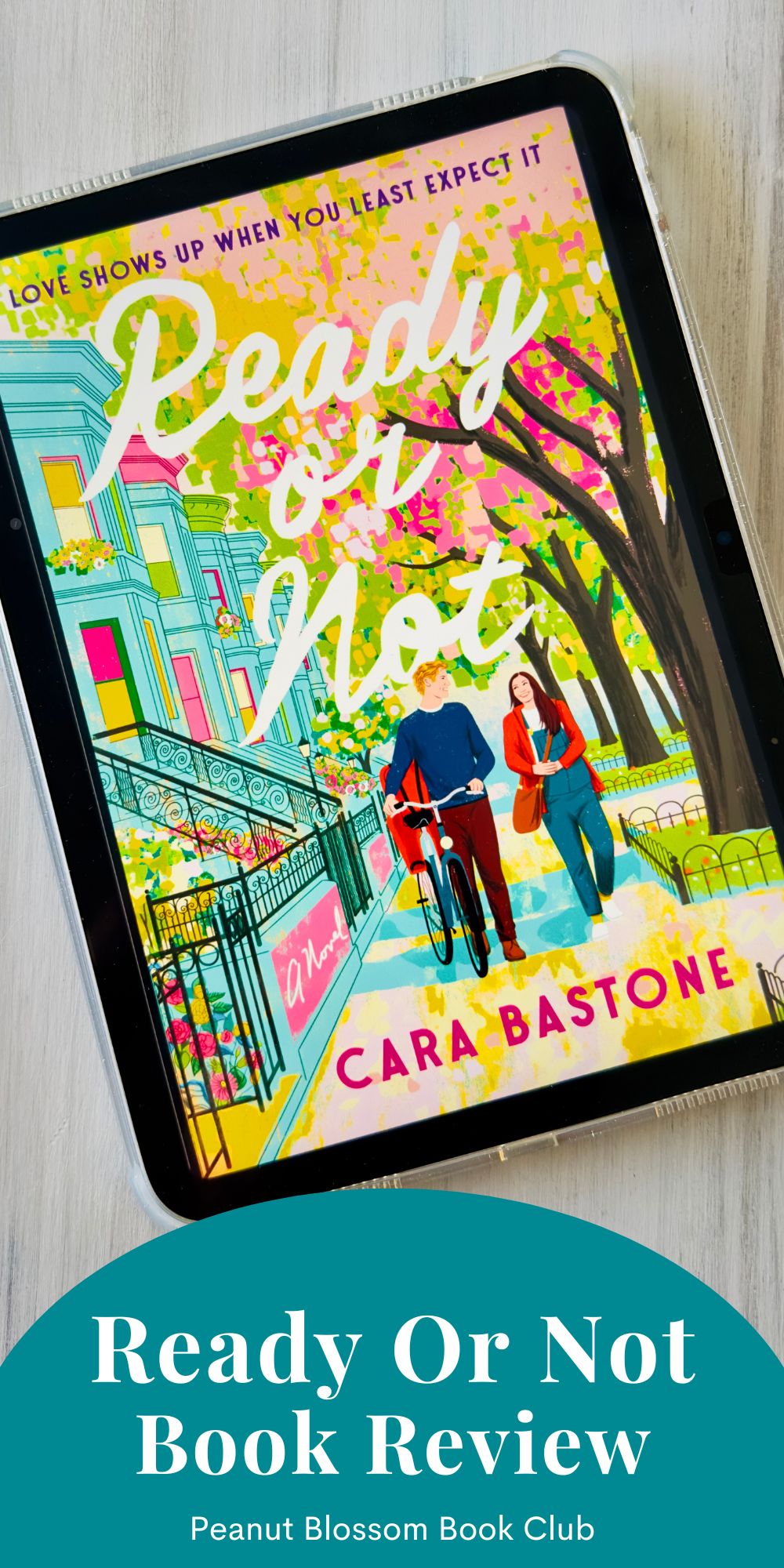 The cover of the book Ready or Not by Cara Bastone is on the screen of an ipad.