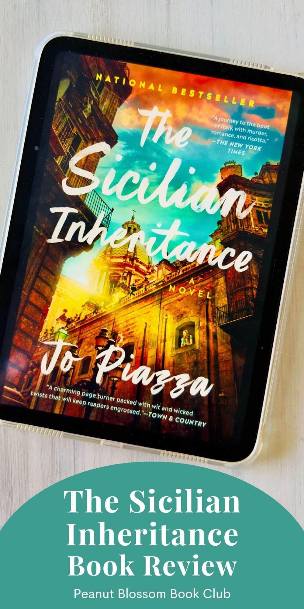 The cover of The Sicilian Inheritance by Jo Piazza is on the screen of an iPad.