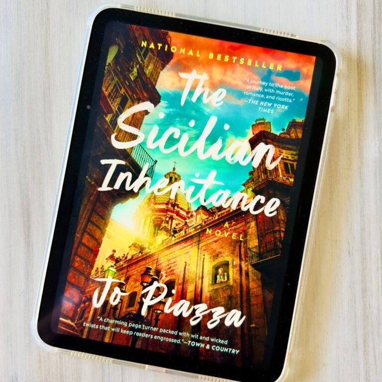 The cover of The Sicilian Inheritance by Jo Piazza is on the screen of an iPad.