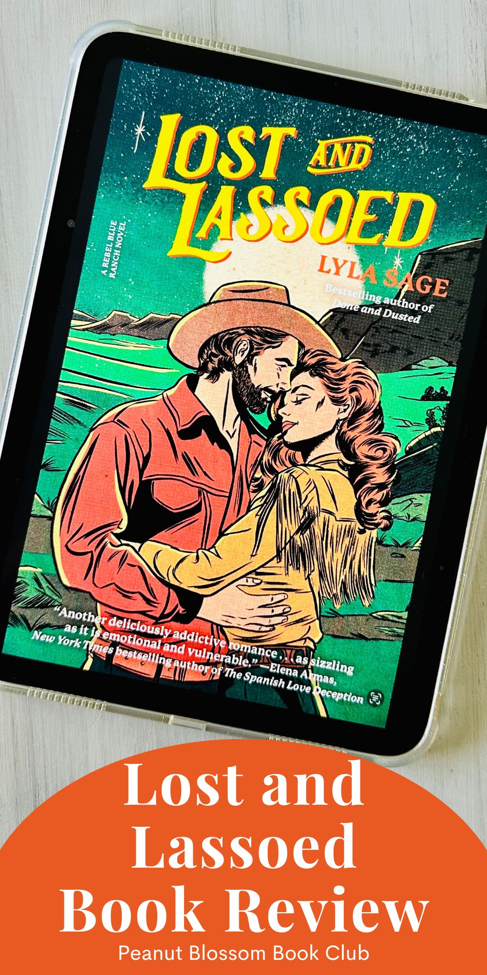 The cover of the book Lost and Lassoed by Lyla Sage is on the screen of an iPad.