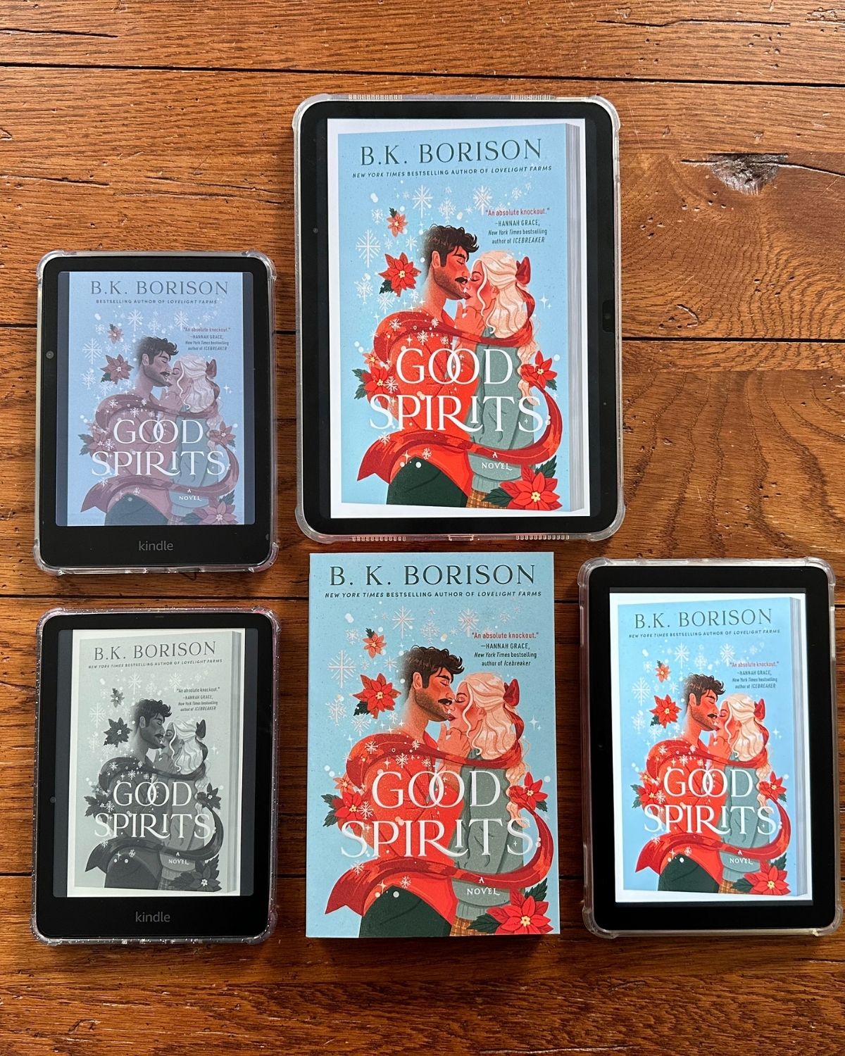 The same book cover is on the screen of multiple Kindles, an iPad, and an Amazon Fire.