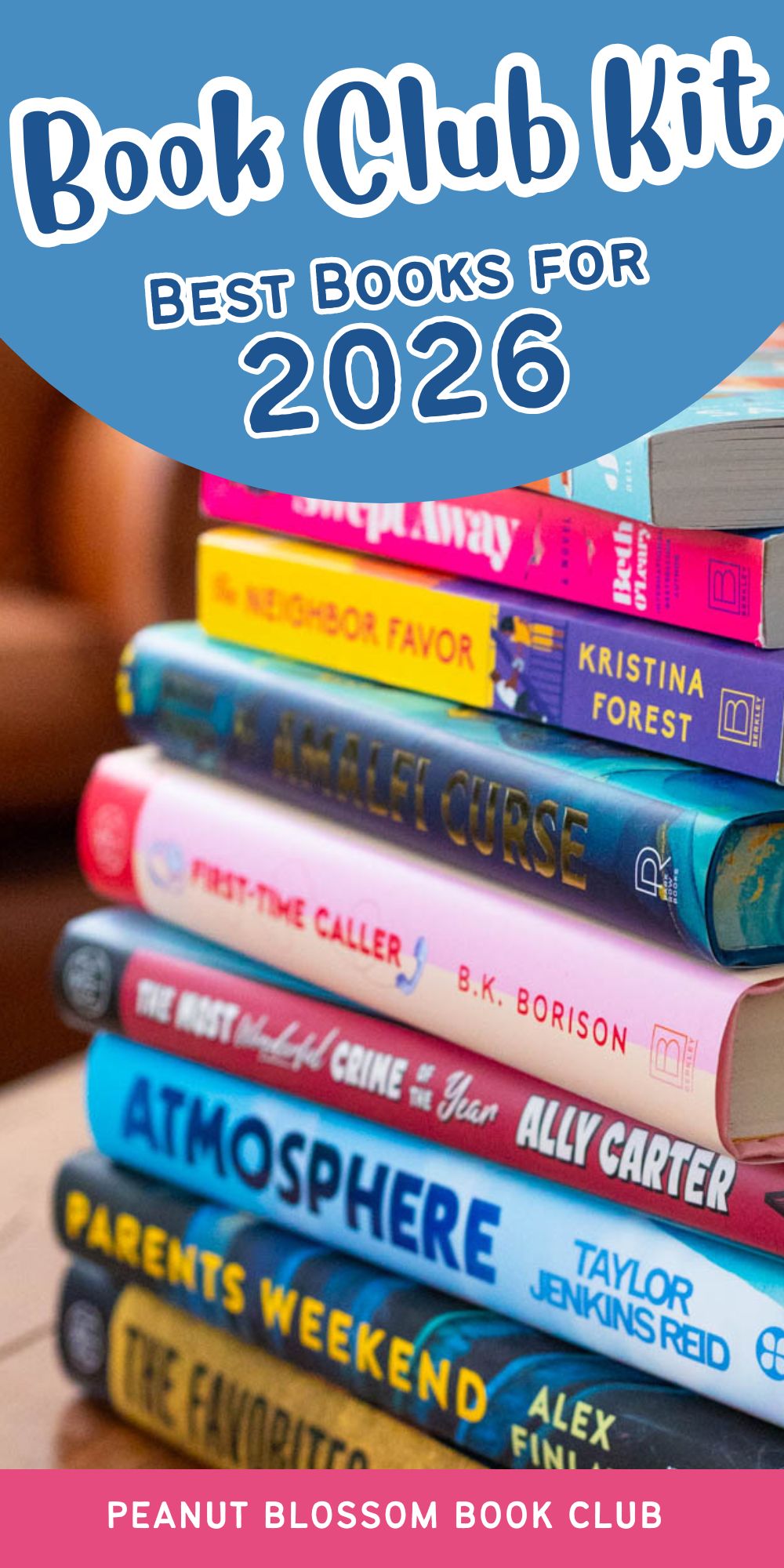A stack of book club books for 2026 are on the table.