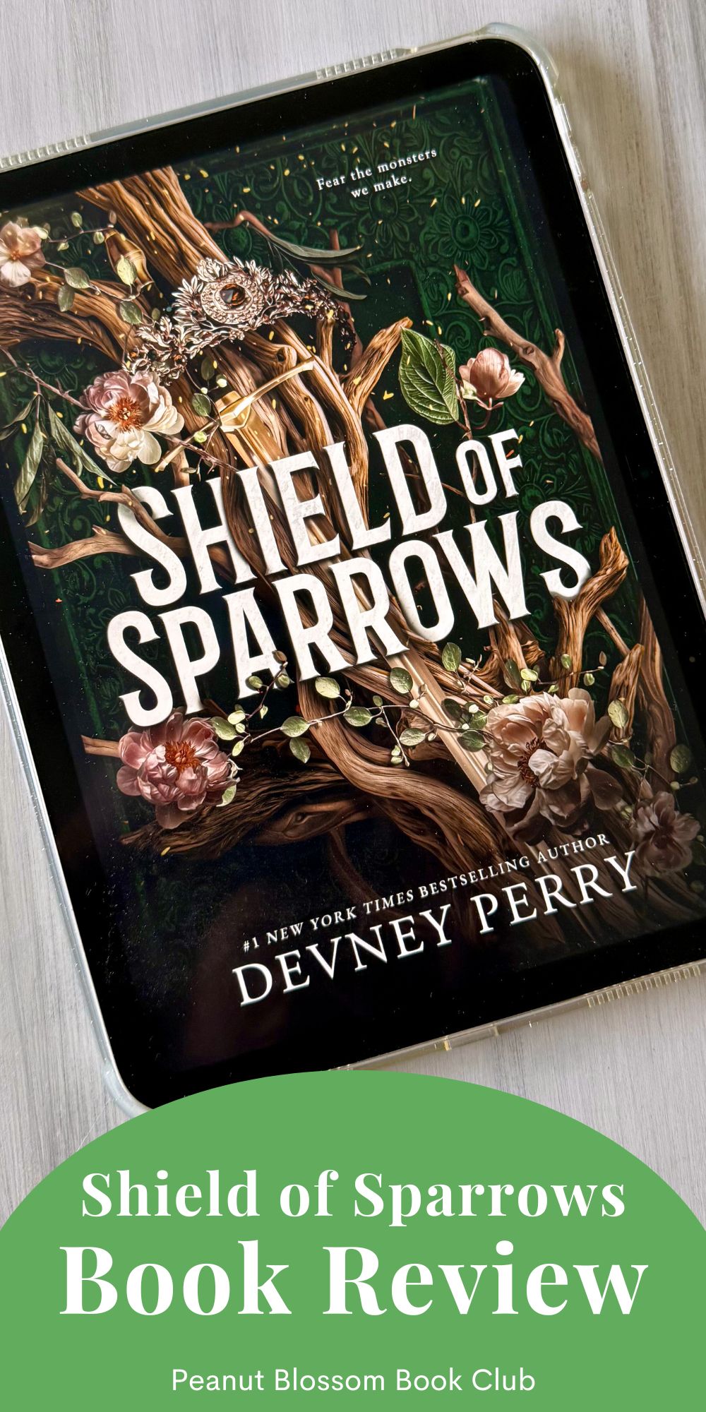 The cover of the book Shield of Sparrows by Devney Perry is on the screen of an ipad.