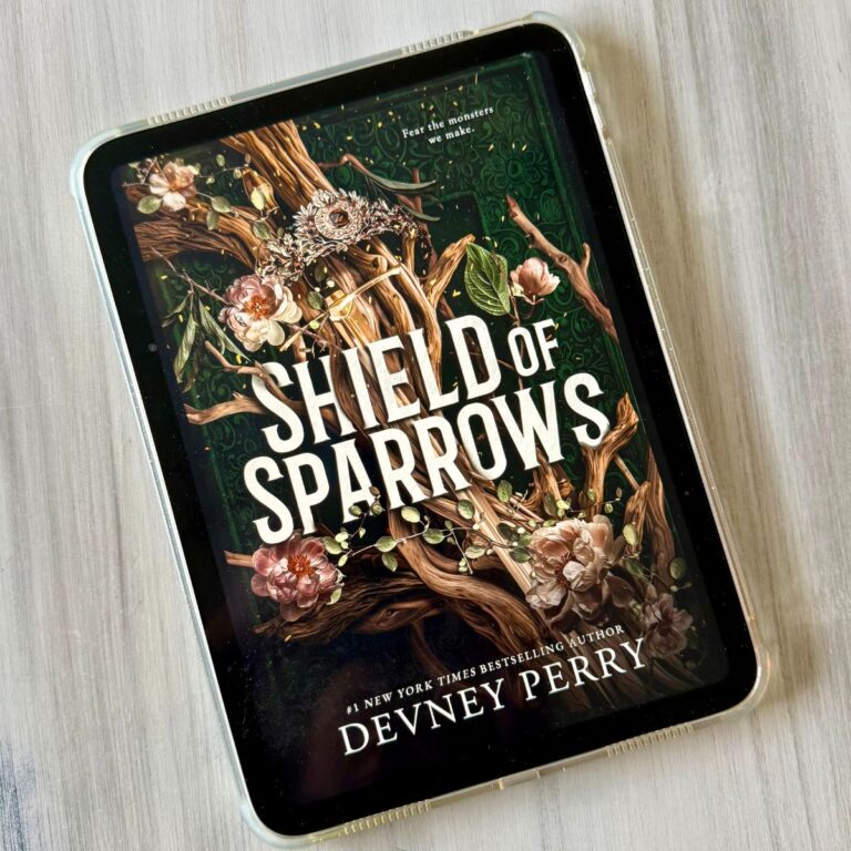 The cover of the book Shield of Sparrows by Devney Perry is on the screen of an iPad.